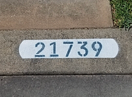 white-back-curb-number